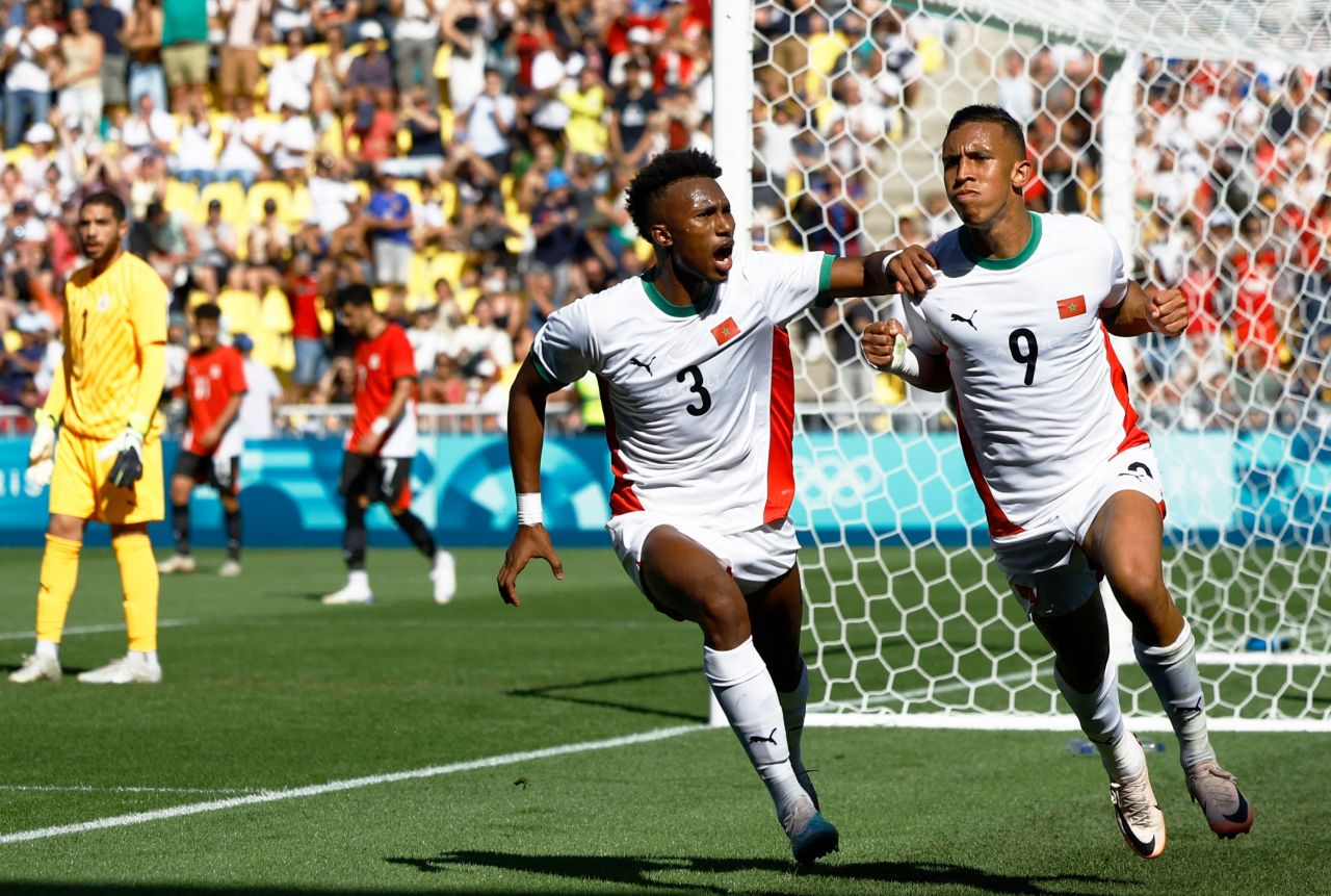 Soufiane Rahimi, right, and Akram Nakach of Morocco celebrate scoring a goal against Egypt on Thursday.