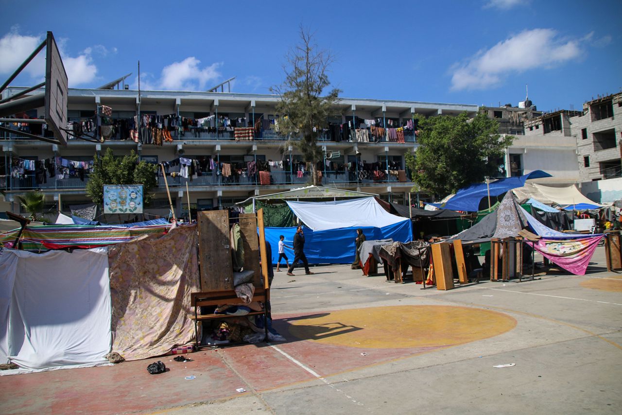 Displaced Palestinians take shelter at a UNRWA school in Khan Yunis, Gaza, on October 15.