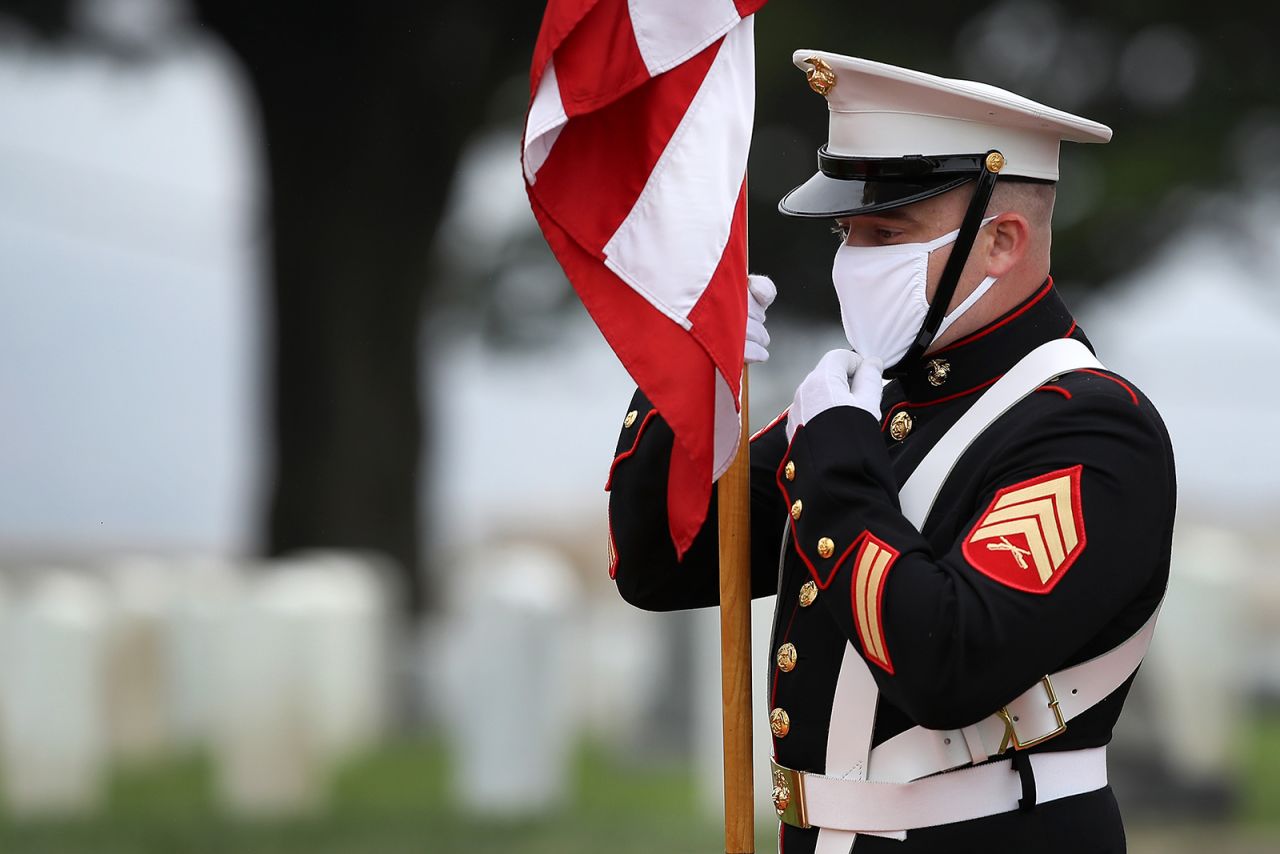 A Marine Color Guard presents colors during a Memorial Day ceremony at Fort Rosecrans National Cemetery on May 25, in San Diego, California. 