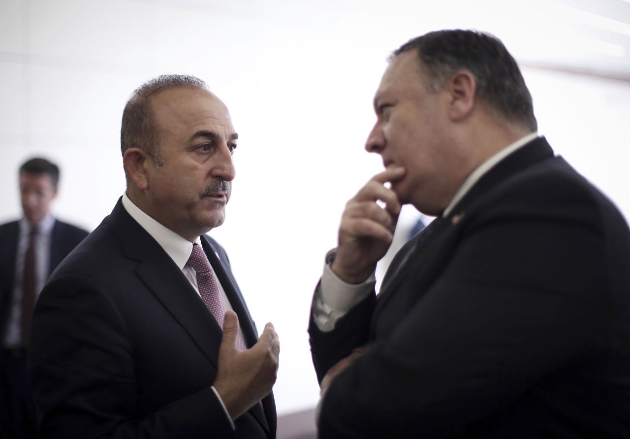 Turkish Foreign Minister Mevlut Cavusoglu, pictured left, talks with US Secretary of State Mike Pompeo in Ankara, Turkey, on Wednesday.