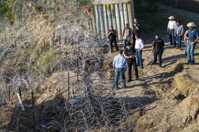 Musk, wearing a black Stetson hat, visits the US-Mexico border in Eagle Pass, Texas, in September 2023. He toured the border with Texas Rep. Tony Gonzales to learn more about the migrant crisis, which he has called a 