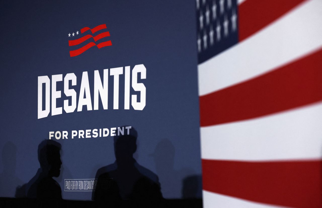 People attend Florida Governor and Republican presidential candidate Ron DeSantis's Iowa caucus watch party, in West Des Moines, Iowa, on January 15.