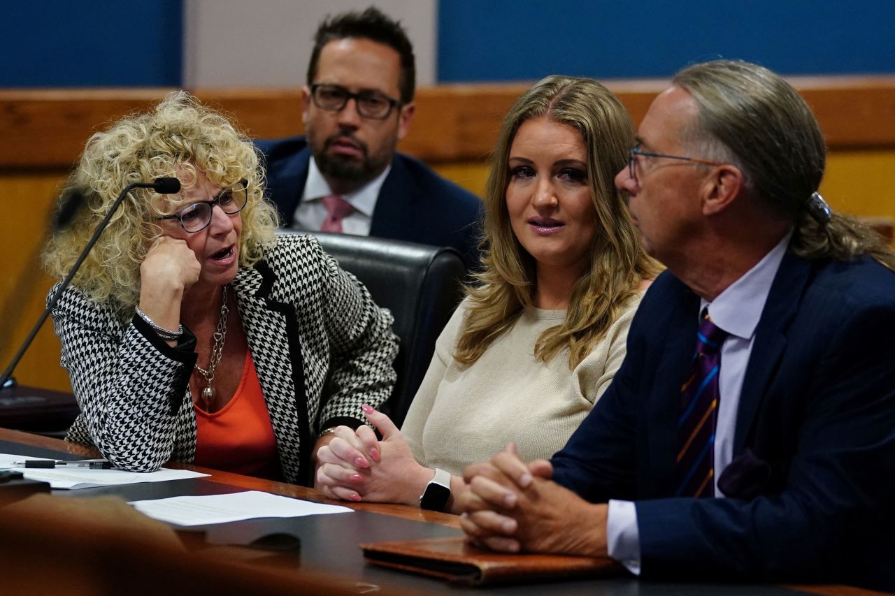 Jenna Ellis sits with her lawyers after pleading guilty inside a Fulton County Courtroom in Atlanta on Tuesday.