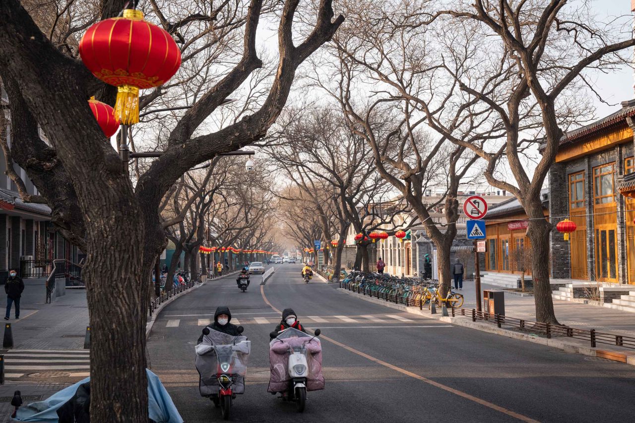 Motorists travel along street decorated for the Chinese New Year in Beijing, China, on January 26.