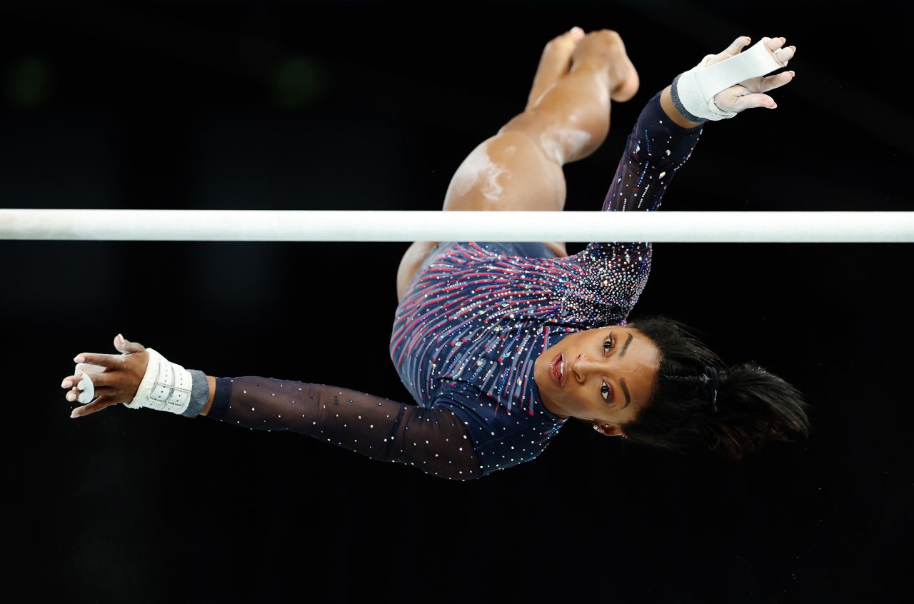 Simone Biles practices on the uneven bars on July 25, in Paris. 