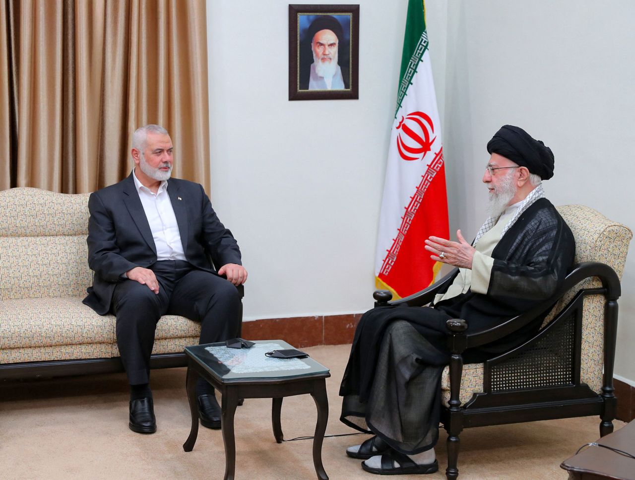 Iran's Supreme Leader Ayatollah Ali Khamenei, right, meets with Hamas political leader Ismail Haniyeh in Tehran, Iran, on July 30.