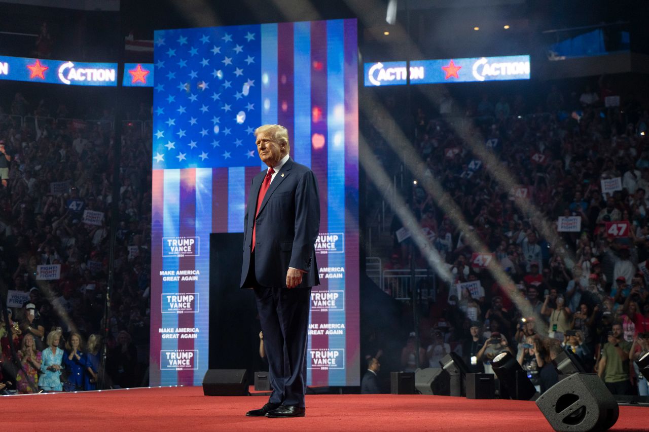 Republican presidential nominee, former U.S. President Donald Trump takes the stage during a campaign rally  in Glendale, Arizona, on August 23.?