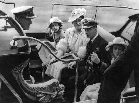 The royal family arrive at the Royal Naval College in Dartmouth in 1939. Left to right are Prince Philip, Princess Margaret, Queen Elizabeth, King George VI and Princess Elizabeth. The young Princess Elizabeth would be dazzled by the young naval cadet on this visit. 
