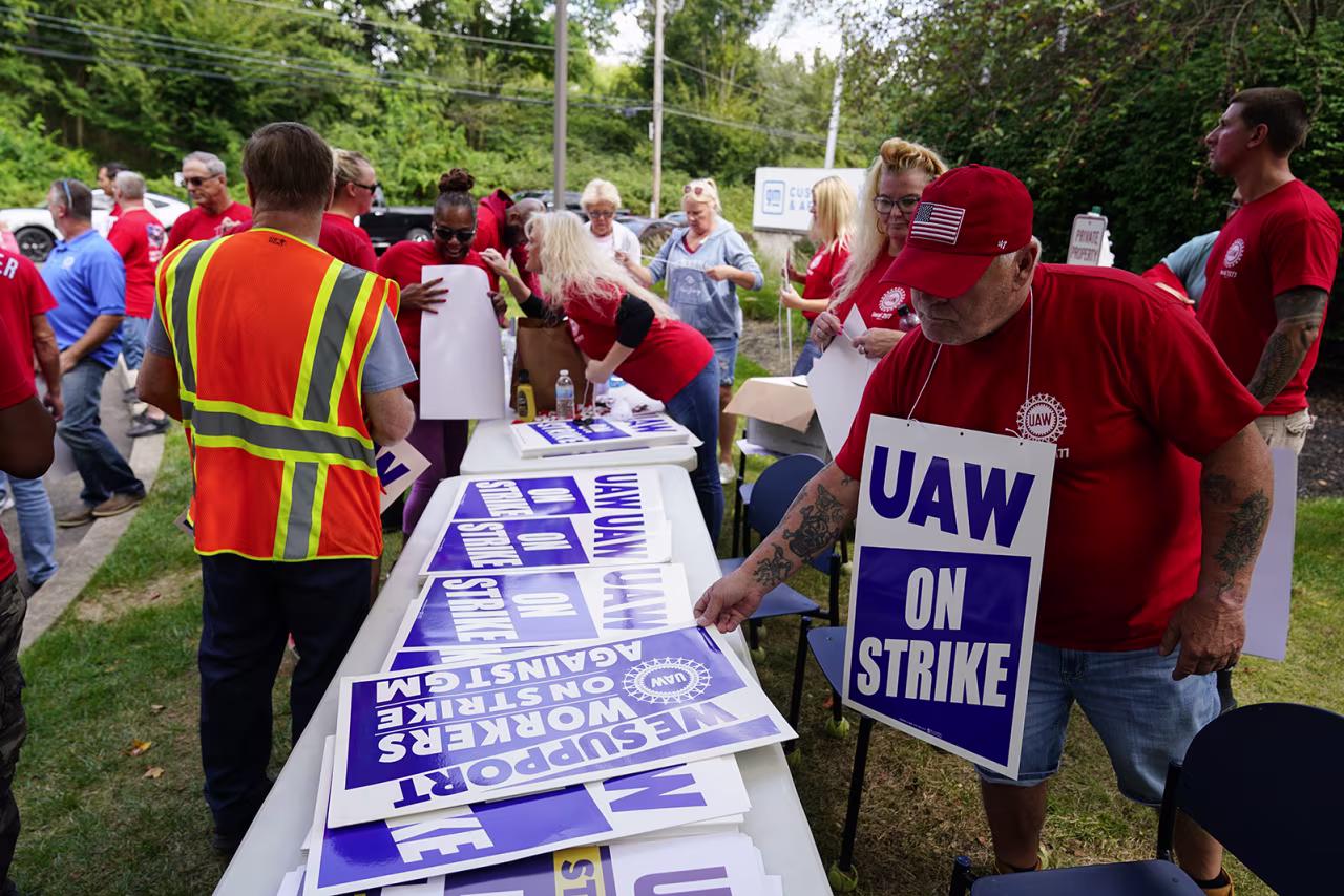United Auto Workers members and supporters picket outside a General Motors facility today in Langhorne, PA.