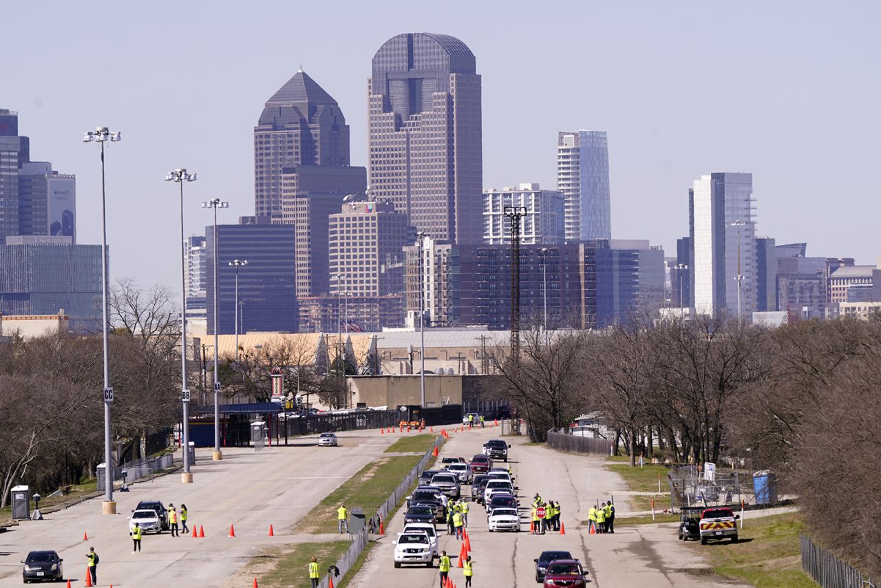 Drivers line up to receive the first and second dose of the Pfizer's Covid-19 vaccine on Wednesday, March 3, in Dallas.