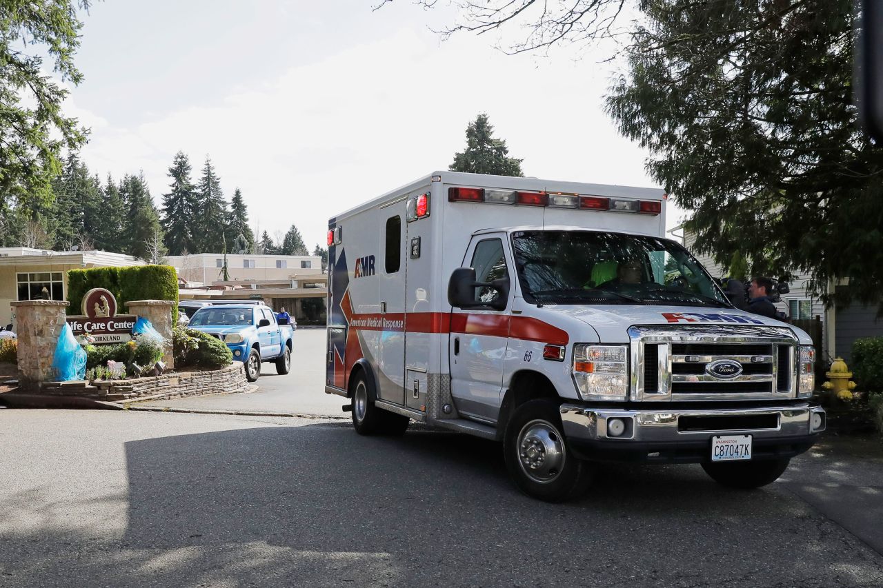 An ambulance leaves Life Care Center in Kirkland, Washington on March 12. 