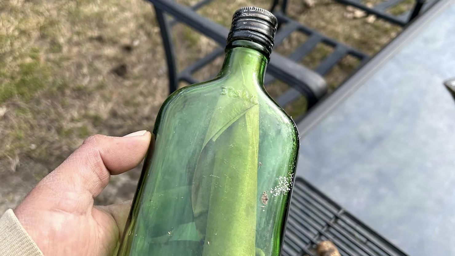 Local waterfowl guide Adam Travis came across a decades-old message in a bottle in Shinnecock Bay, New York.