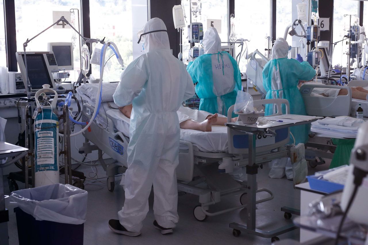 Healthcare workers tend coronavirus patients at in the intensive care unit at the Vall d'Hebron Hospital in Barcelona, Spain, on April 6.