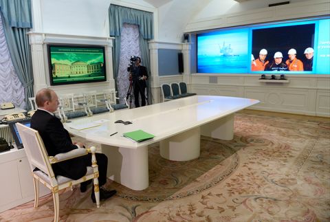Russian President Vladimir Putin has a video conference with the Berkut offshore drilling platform launched in the Sea of Okhotsk as part of the Sakhalin-1 oil and gas project, in Moscow, Russia, Friday, June 27, 2014. 