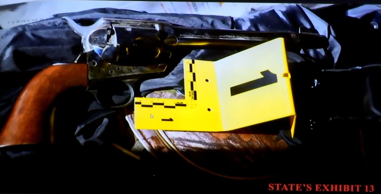 The gun that Hannah Gutierrez Reed handed to Lt. Timoteo Benavidez on the day of the shooting is seen on a screen in court on Wednesday.