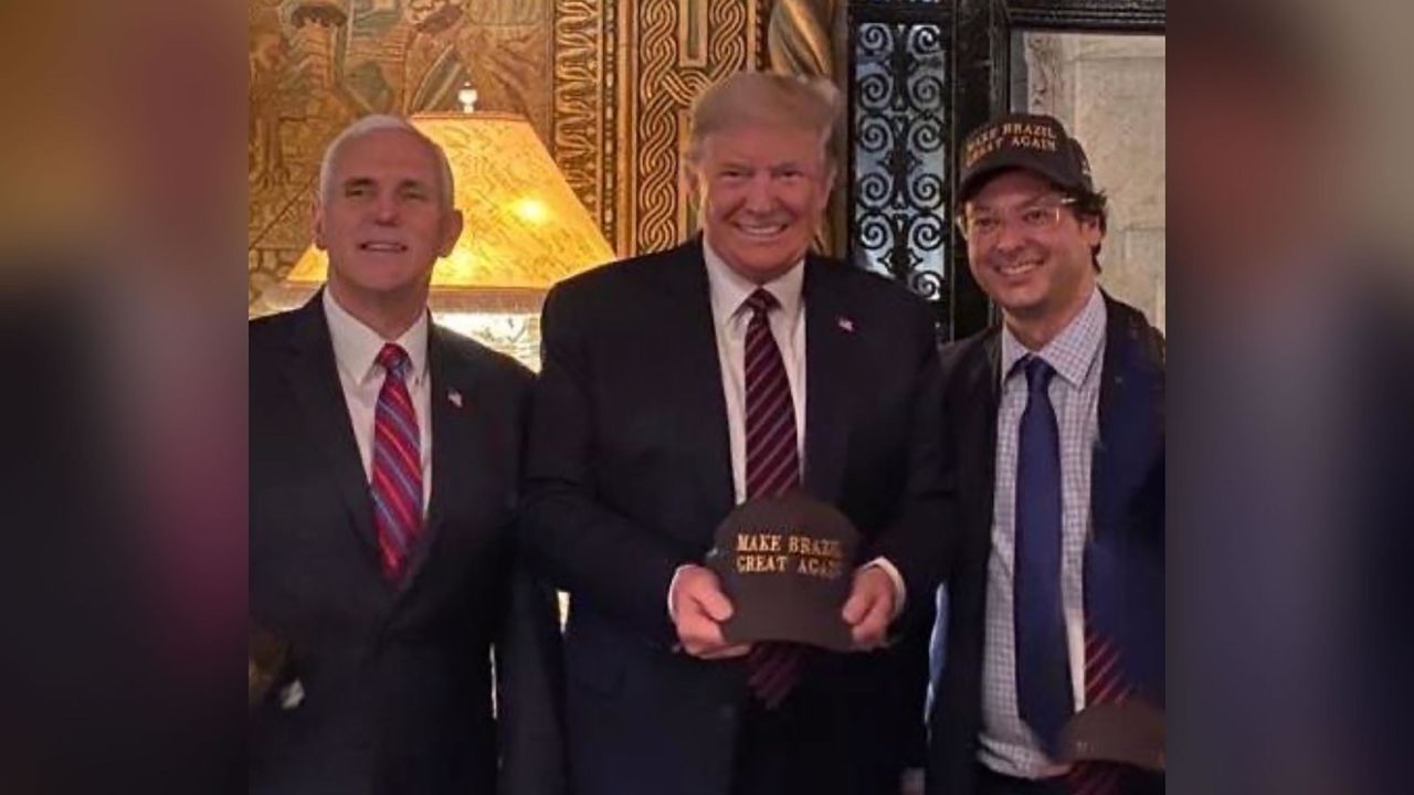 Fabio Wajngarten (right), the press secretary for Brazilian president Jair Bolsonaro, with US President Donald Trump and Vice President Mike Pence at Mar-a-Lago on Saturday, March 7, 2020.