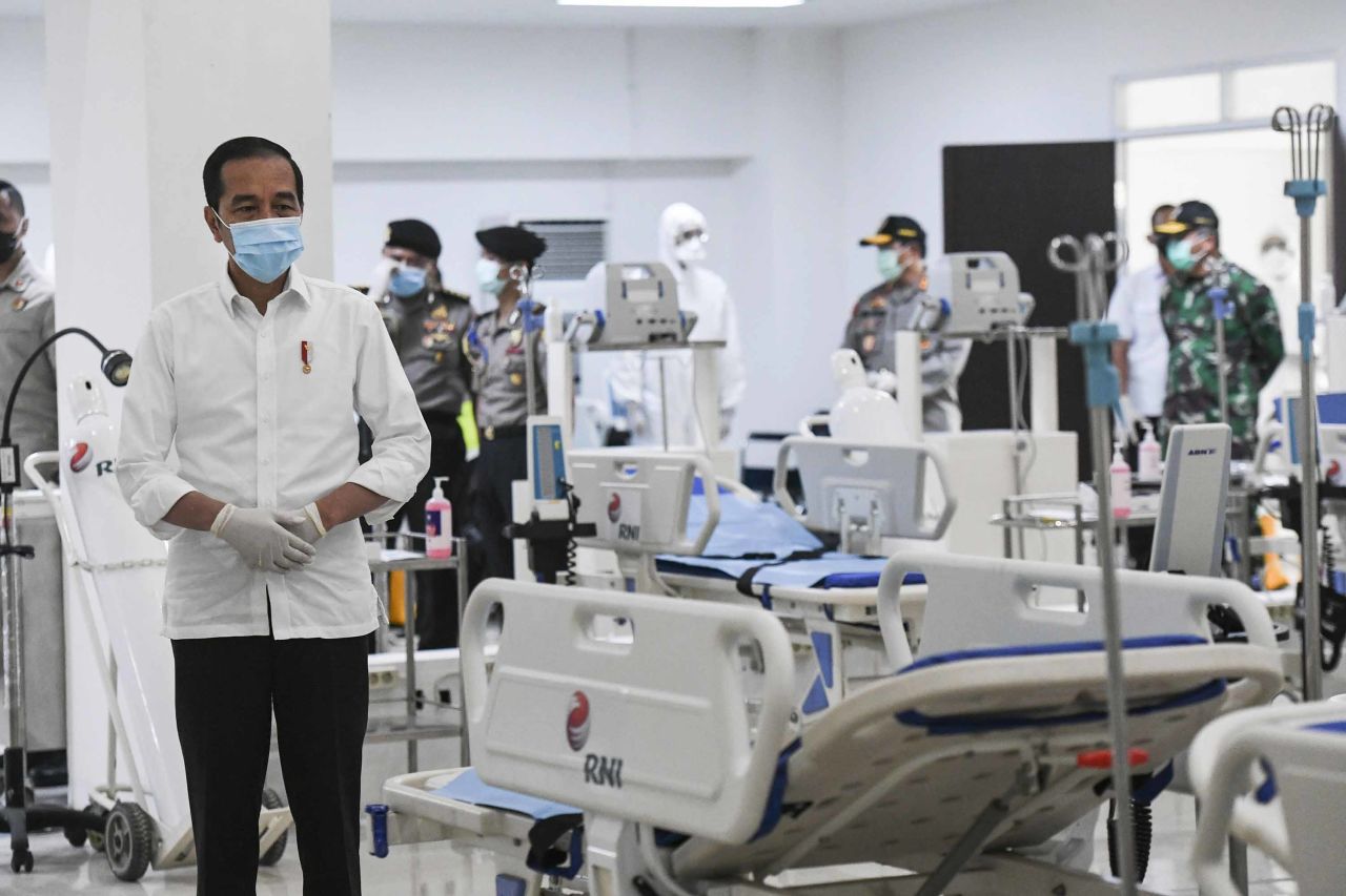 Indonesian President Joko Widodo, left, inspects medical equipment at a hospital in Jakarta, Indonesia, on March 23.