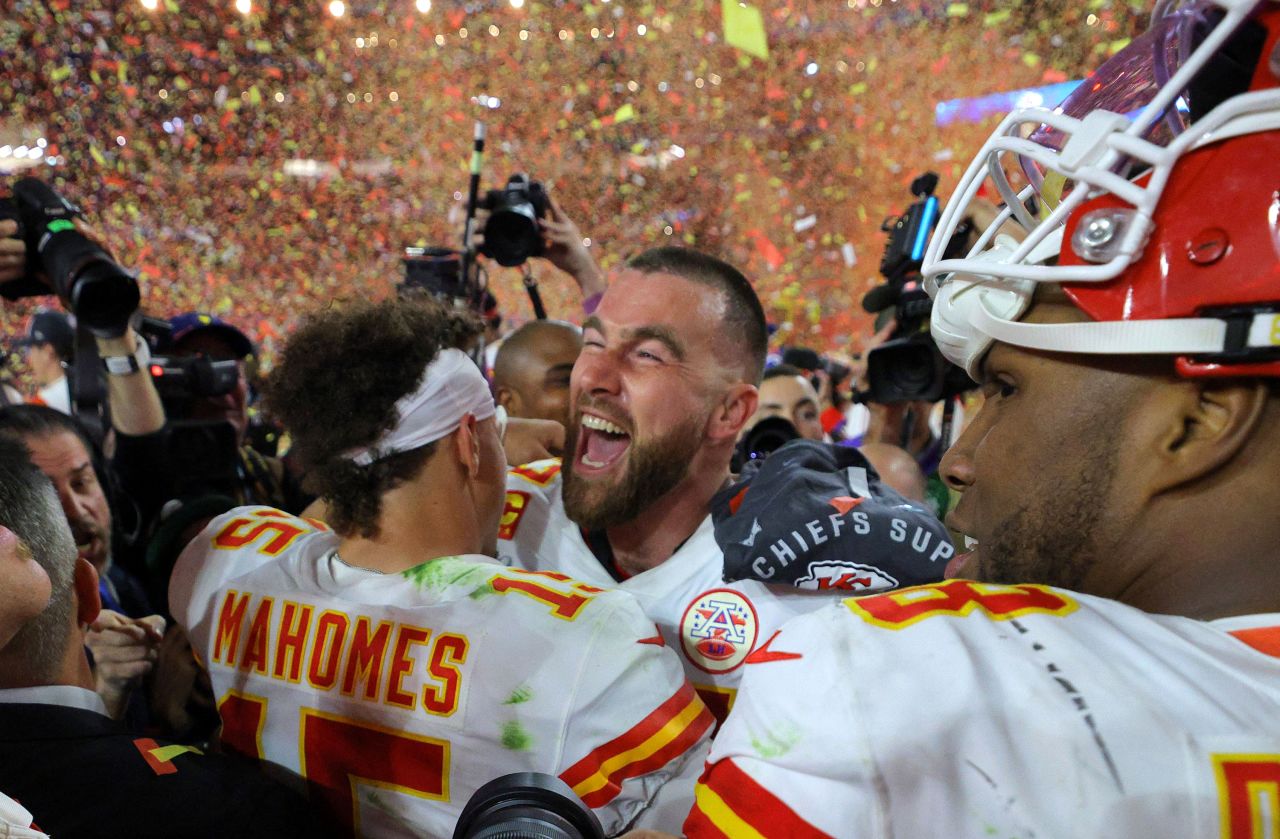 Travis Kelce celebrates with Patrick Mahomes after winning Super Bowl LVII.
