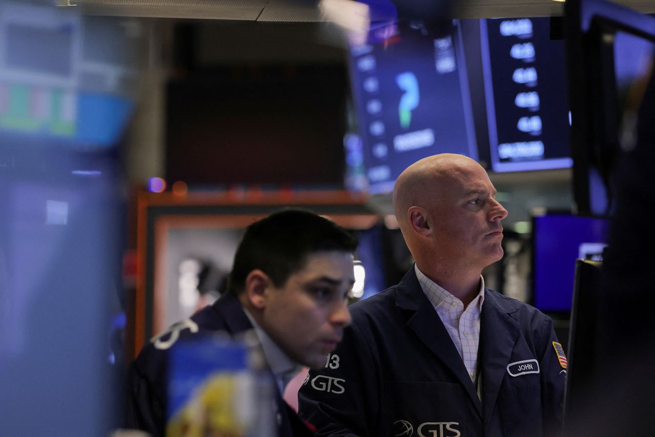 Traders work on the floor of the?New?York?Stock?Exchange?on March 15.