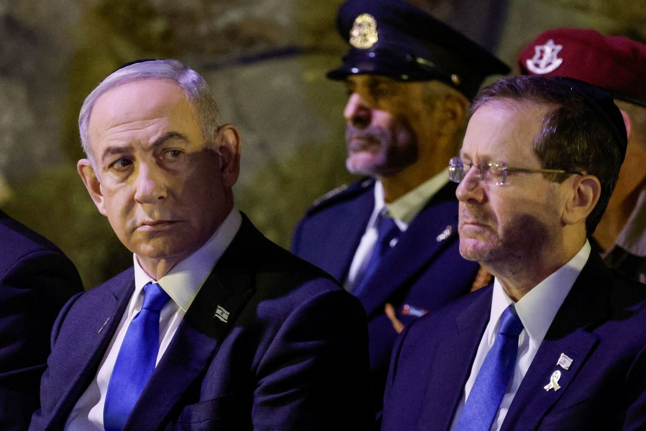 Israeli Prime Minister Benjamin Netanyahu, left, attends a wreath-laying ceremony marking Holocaust Remembrance Day in Jerusalem on May 6.