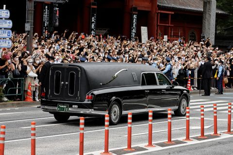 Crowds gather in Tokyo on Tuesday for the funeral of former Japanese Prime Minister Shinzo Abe.