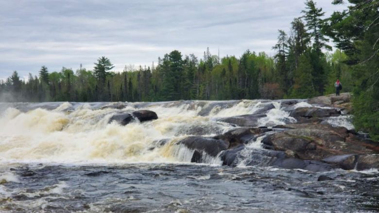 Two people are missing after going over Minnesota waterfall in canoes