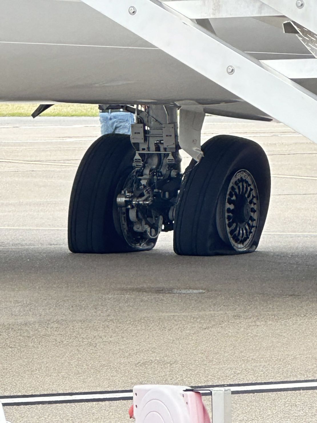 The wheels of a plane are seen after a near-collision involving a Southwest Airlines flight and an Alaska Airlines flight at Nashville International Airport Thursday morning.