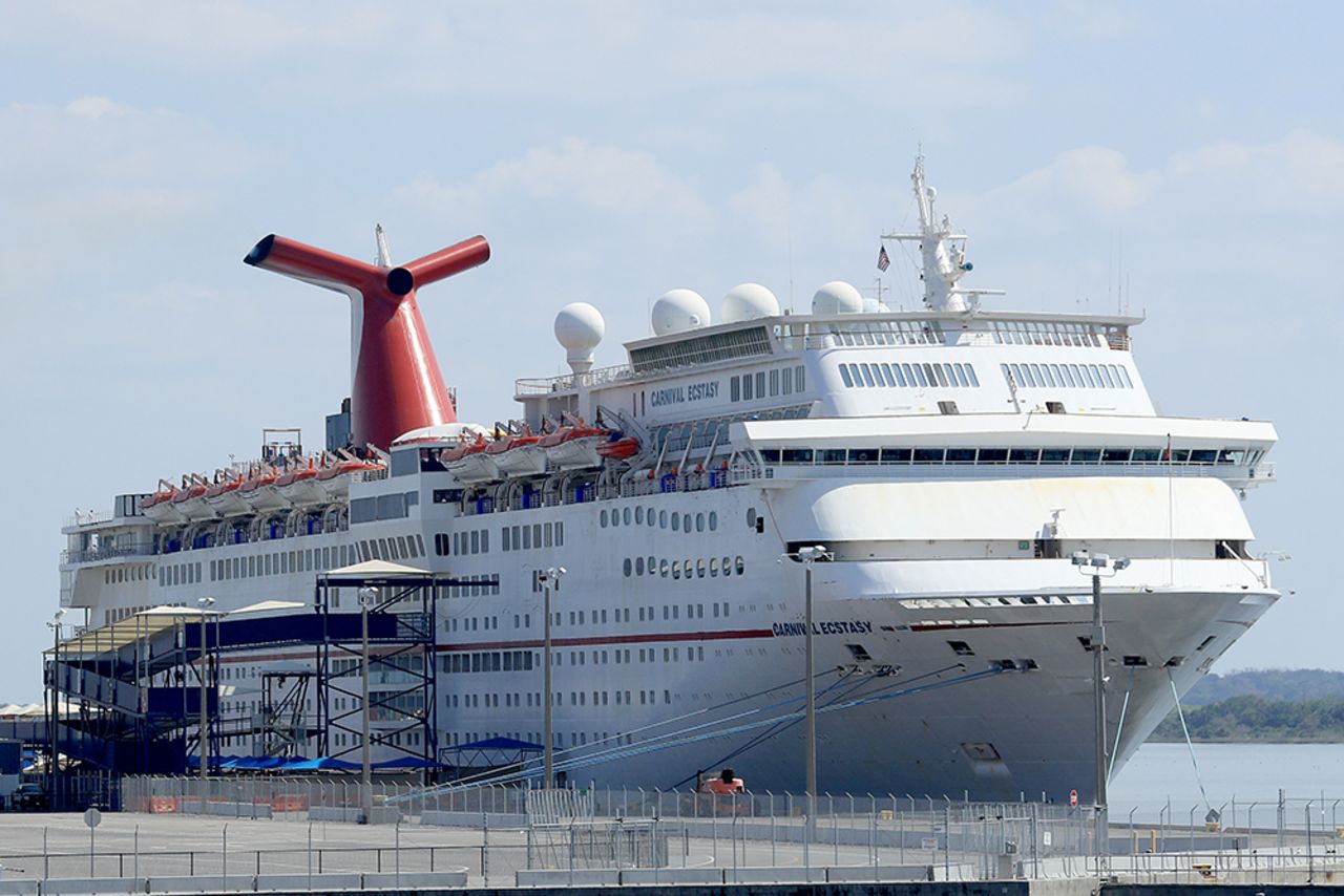 Carnival Cruise Line's Carnival Ecstasy cruise ship is docked at the Port of Jacksonville amid the Coronavirus outbreak on March 27 in Jacksonville, Florida.