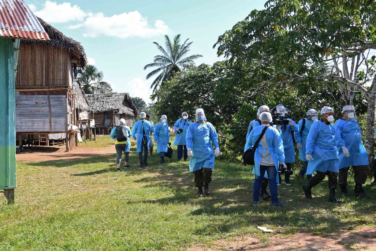 A medical team from the Brazilian Armed Forces arrives at the Cruzeirinho village in Amazonas state, northern Brazil, on June 18, to assist members of the indigenous population amid the pandemic.