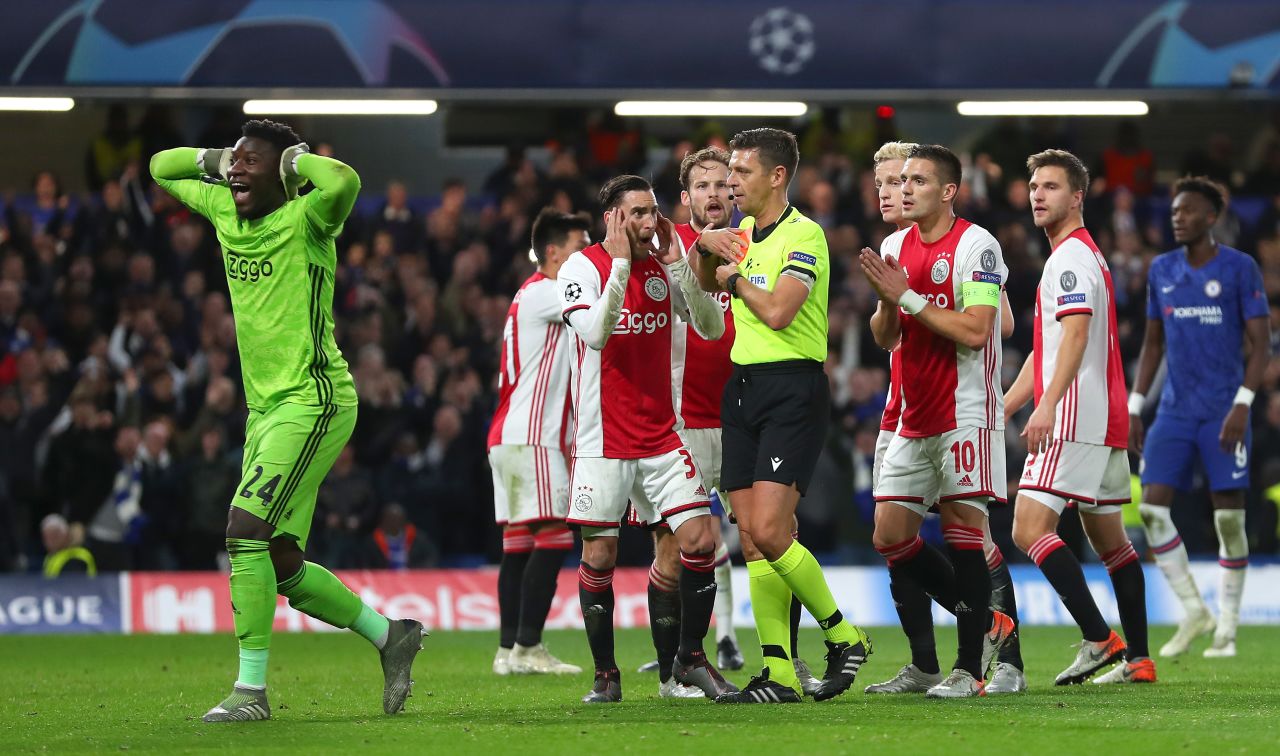 Andre Onana and Dusan Tadic of Ajax react after two red cards are given against their side.