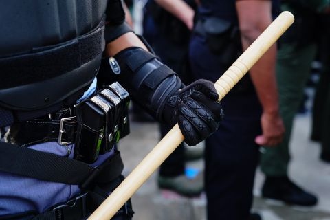 An Atlanta police officer holds a baton during a protest over th death of George Floyd on May 29, in Atlanta.