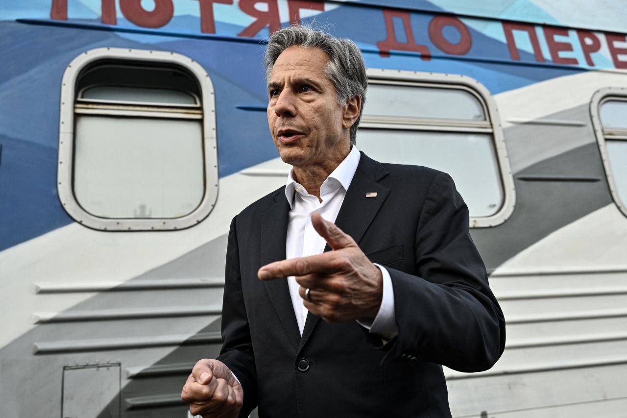 US Secretary of State Antony Blinken talks to the press before boarding a train during his visit in Kyiv on September 8.