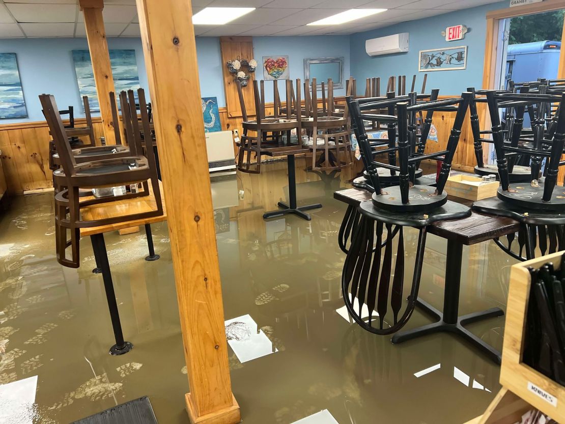 Mud and standing water are seen inside Papa Tirozzi’s Bakery, Pizza and Fish Shack on Tuesday.