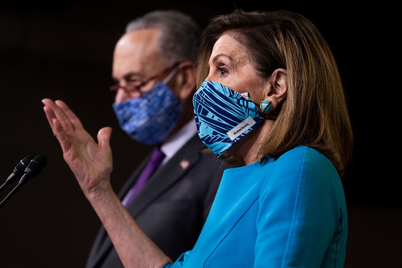 House Speaker Nancy Pelosi and Senate Minority Leader Chuck Schumer speak at a news conference on Thursday.