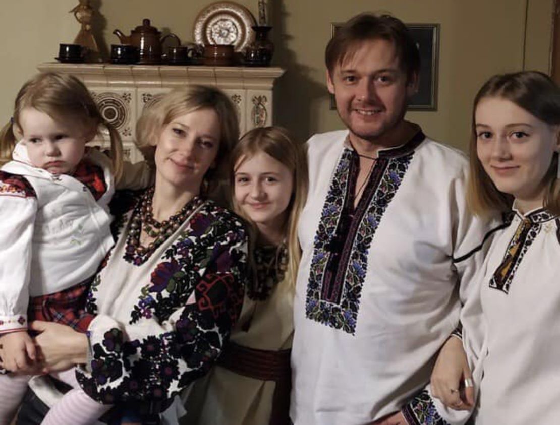 The family are pictured wearing vyshivankas, the traditional Ukrainian national costume.