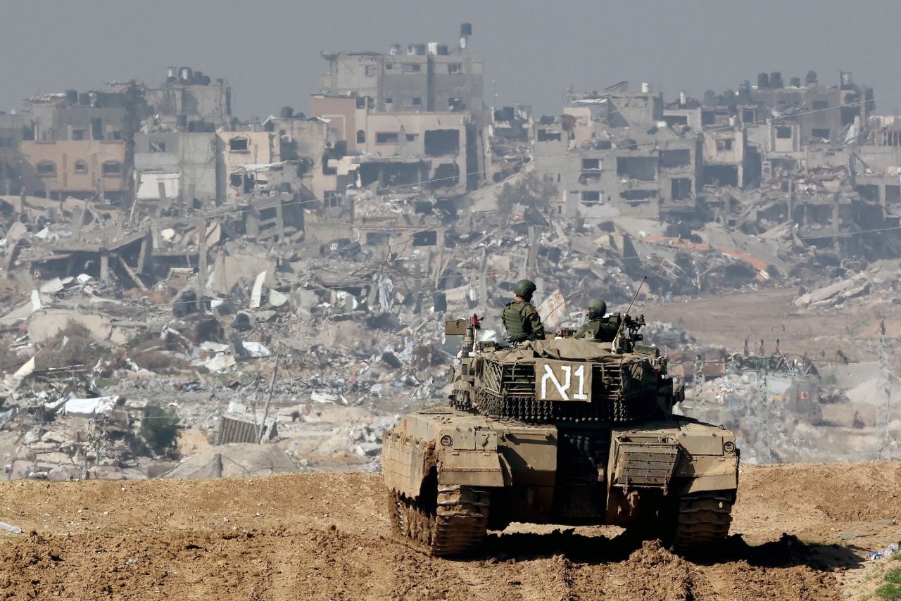 An Israeli tank is seen facing Gaza on January 19.