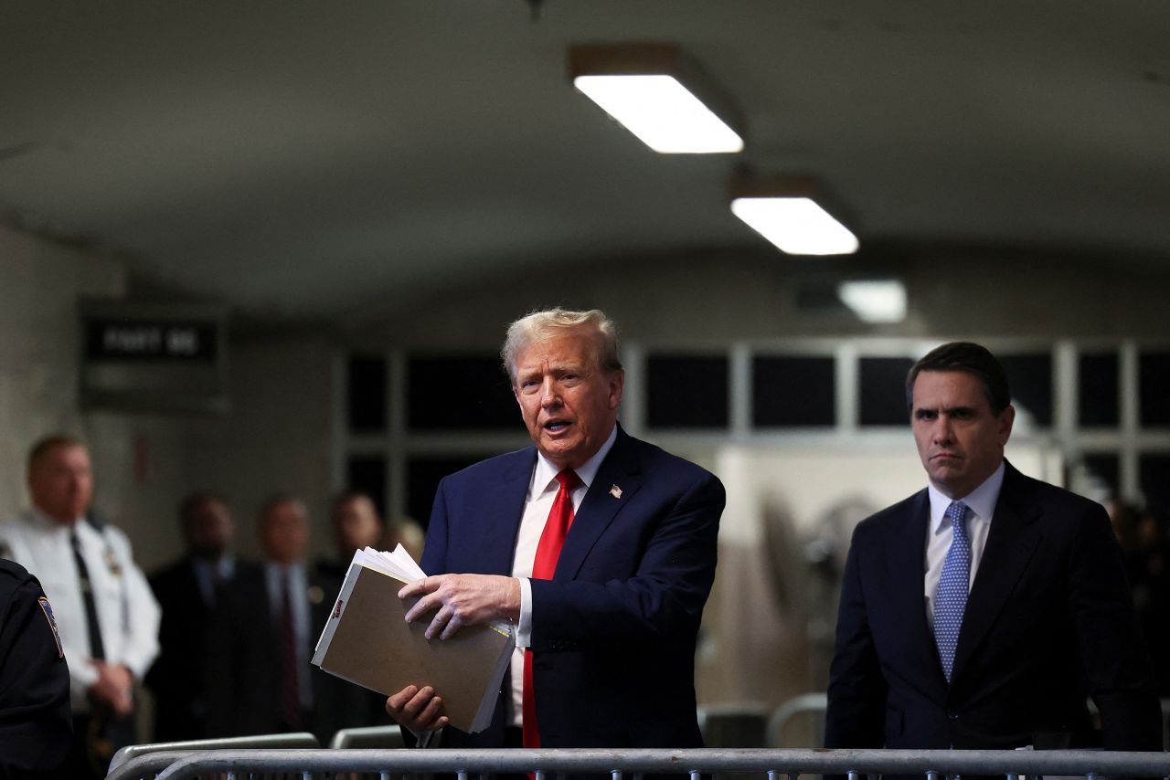 Former President Donald Trump speaks after leaving Manhattan criminal court on Tuesday in New York.