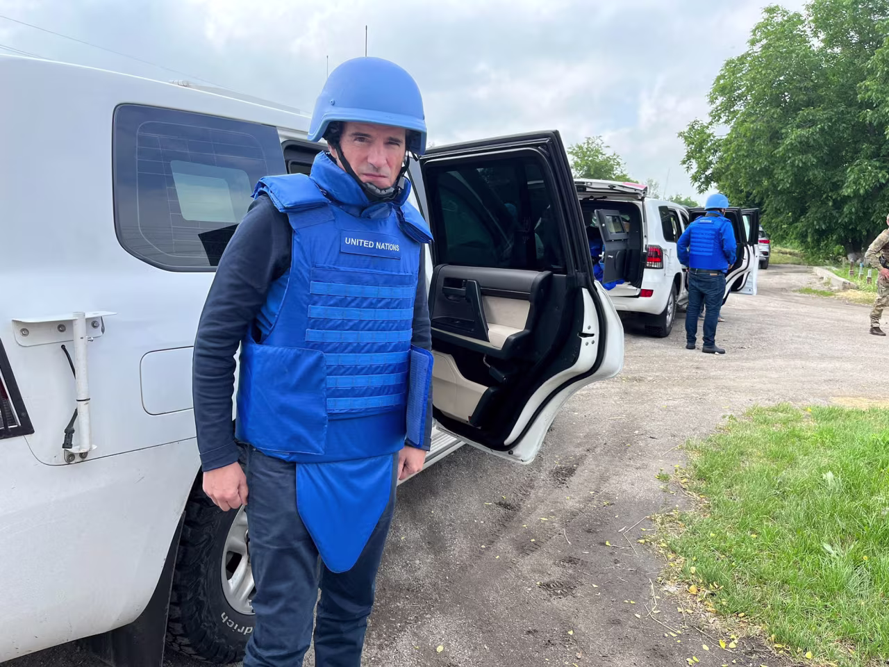 International Atomic Energy Agency (IAEA) Director General Rafael Grossi stands next to an armored car during his trip to the Zaporizhzhia Nuclear Power Plant in Ukraine, on June 15.