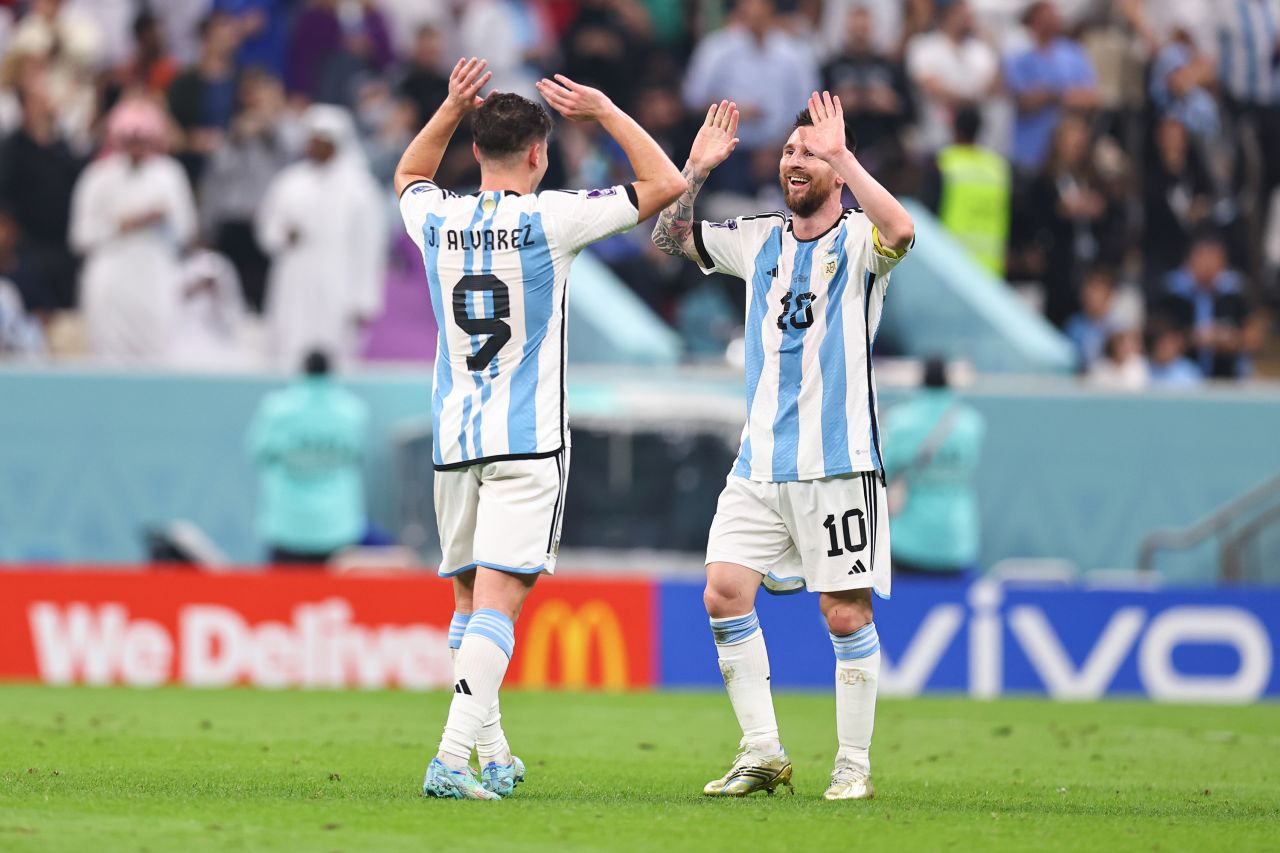 Julián Álvarez and Lionel Messi celebrate after Álvarez scored to make the score 3-0 at Lusail Stadium in Lusail City, Qatar on Tuesday.