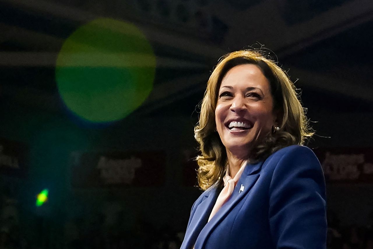 Vice President and Democratic presidential candidate Kamala Harris reacts during a campaign rally with her newly chosen vice presidential running mate Minnesota Governor Tim Walz in Philadelphia, on Tuesday, August 6.