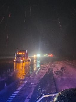 A truck is seen in the water during a flood in New Mexico.