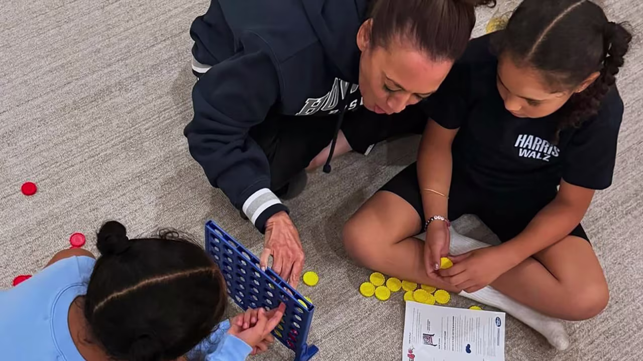 Vice President Kamala Harris plays Connect Four with her grandnieces.