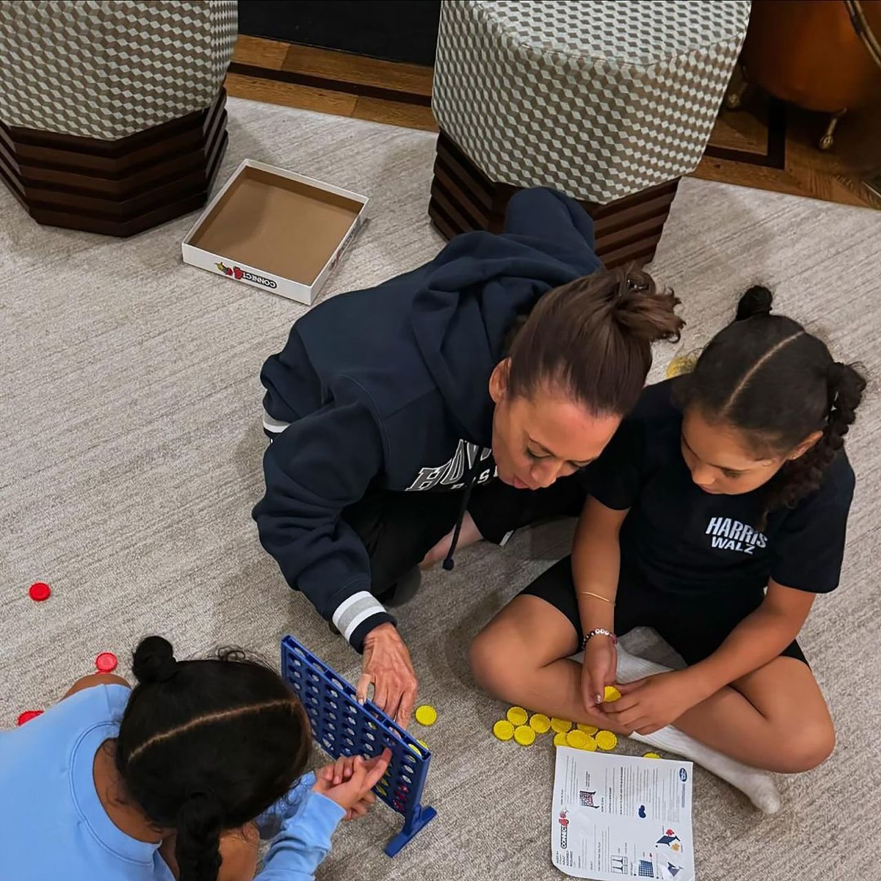 Vice President Kamala Harris plays Connect Four with her grandnieces.