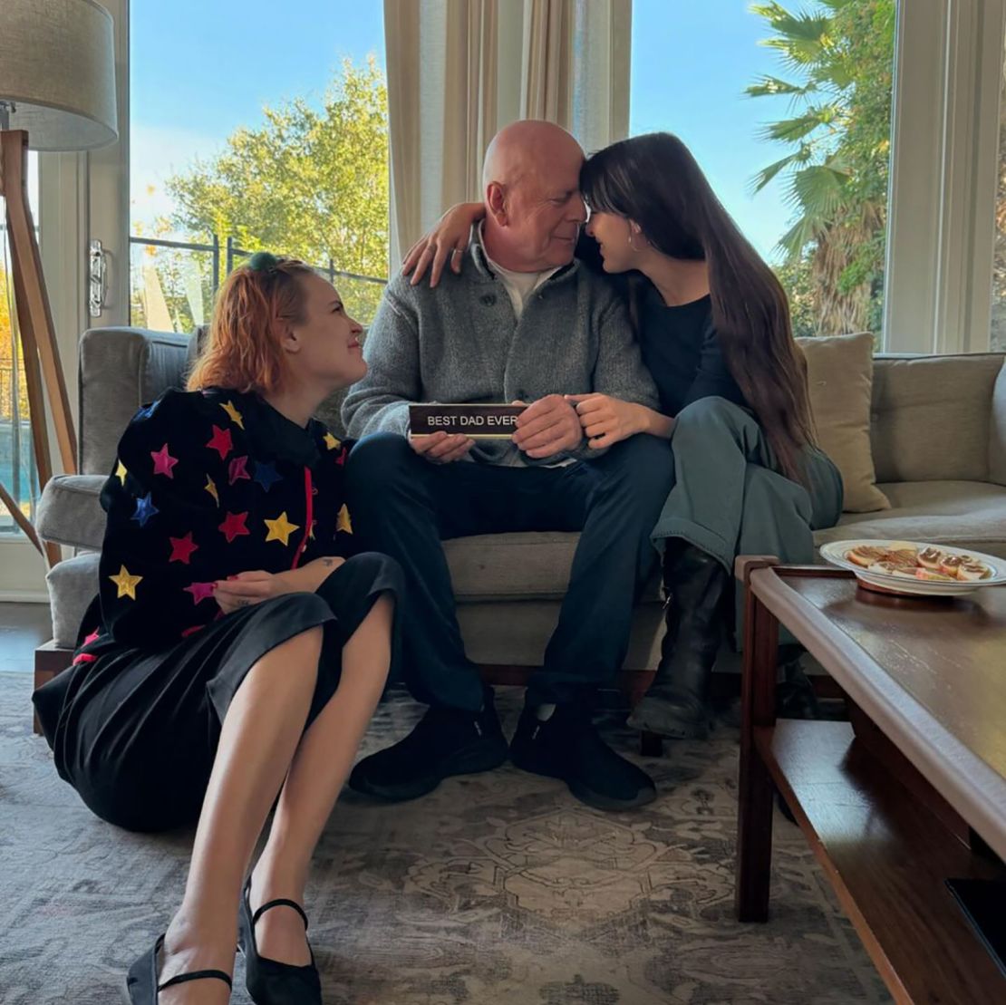 On Thanksgiving, Willis' daughters Tallulah and Scout shared photos on Instagram with their father, where he is seen holding a desk plate that reads “Best Dad Ever.”