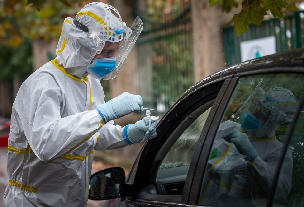 A health care worker in Prague, Czech Republic, conducts a Covid-19 test on October 10.