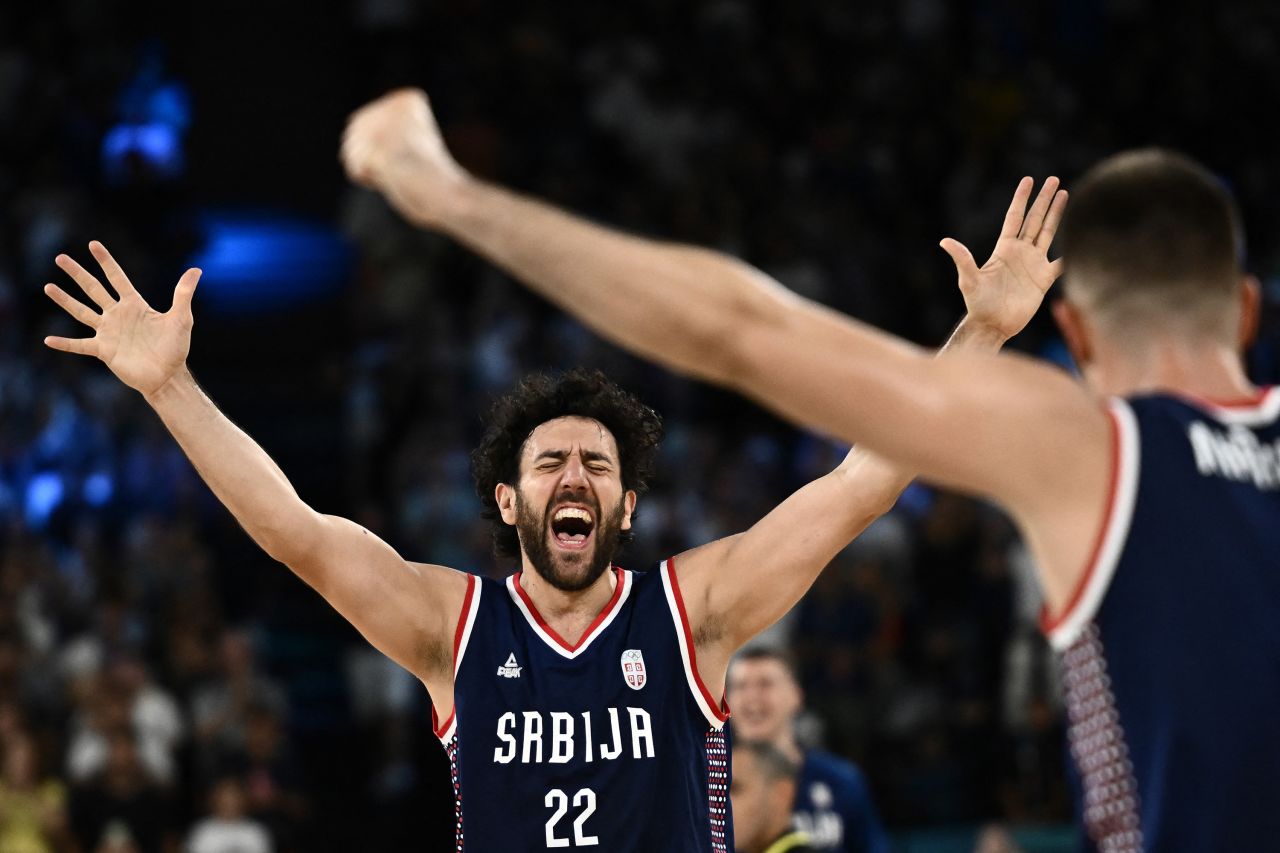 Serbia's Vasilije Micić celebrates after winning the bronze medal for men’s basketball on August 10. 