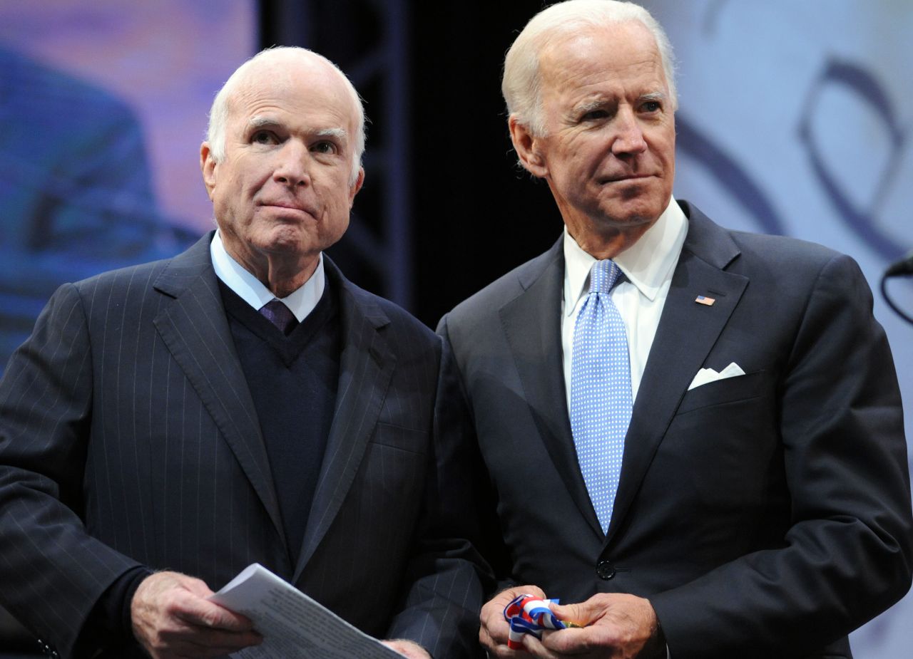 In this file photo, Sen. John McCain (R-AZ) receives the the 2017 Liberty Medal from former Vice President Joe Biden at the National Constitution Center on October 16, 2017 in Philadelphia, Pennsylvania. 