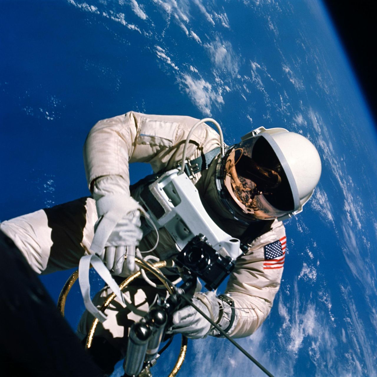 Astronaut Ed White floats in the zero gravity of space outside the Gemini IV spacecraft, on June 3, 1965.