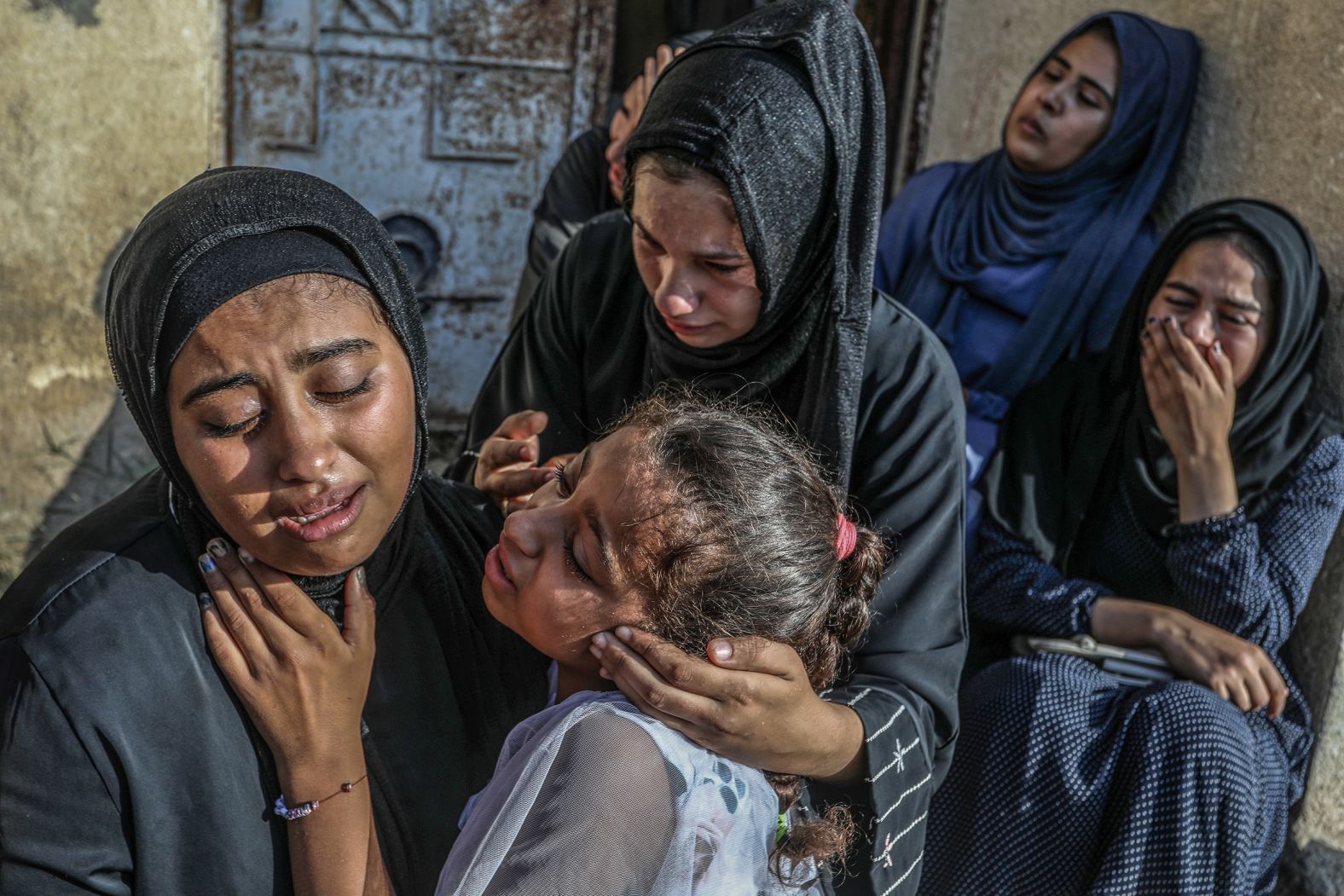 Palestinian women cry July 10 over the loss of relatives who were killed in an Israeli airstrike that hit a school complex housing displaced people in southern Gaza. Local health officials said <a href="https://www.cnn.com/2024/07/09/middleeast/israeli-airstrike-school-khan-younis-intl-latam/index.html">at least 27 people were killed in the strike</a>. The Israeli military said it conducted a strike “near” the Al-Awda school on Tuesday and that it had targeted “a terrorist” who participated in the October 7 attacks.