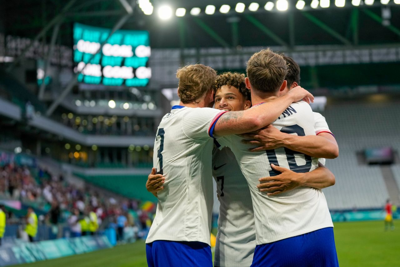 United States' Kevin Paredes is congratulated after scoring his third goal during the men's soccer match between the United States and Guinea at Geoffroy-Guichard Stadium in Saint-Etienne, France on July 30.